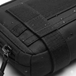 Close-up shot of the water-resistant fabric and reinforced stitching of a molle admin pouch.